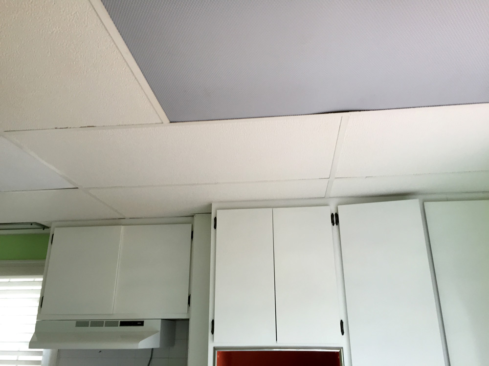 removing a kitchen drop ceiling before 