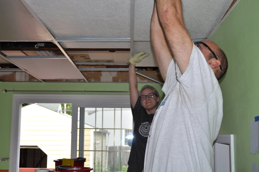 removing a kitchen drop ceiling popping out tiles