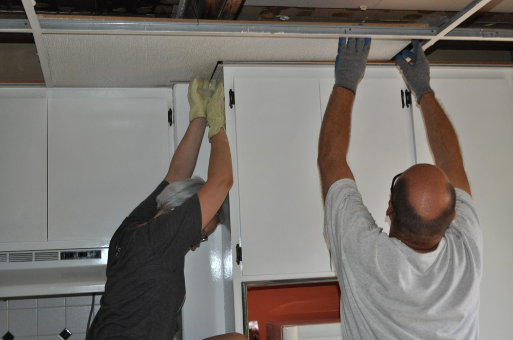 removing a kitchen drop ceiling tile progress 