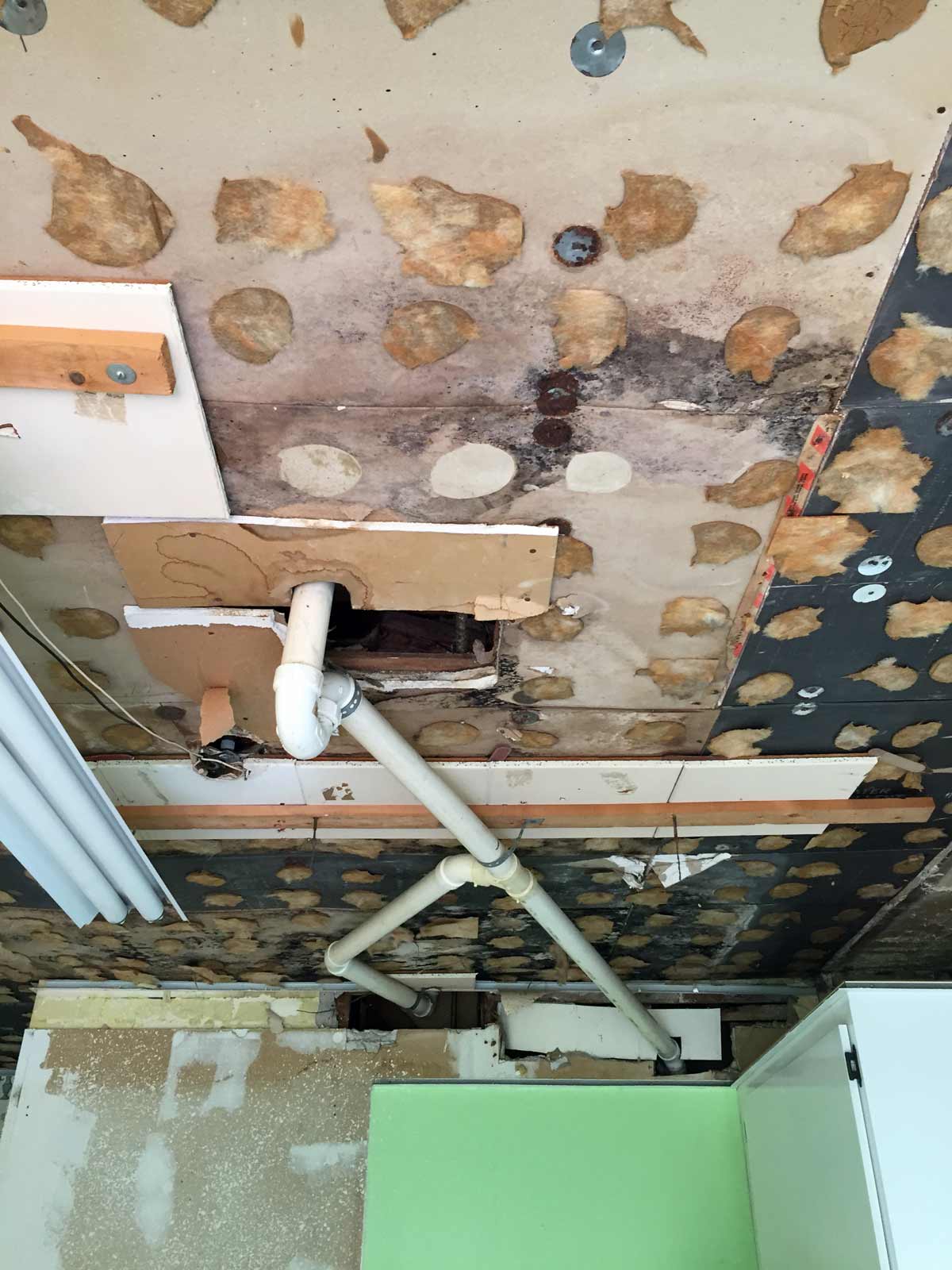 How to deal with unexpected plumbing under a drop ceiling