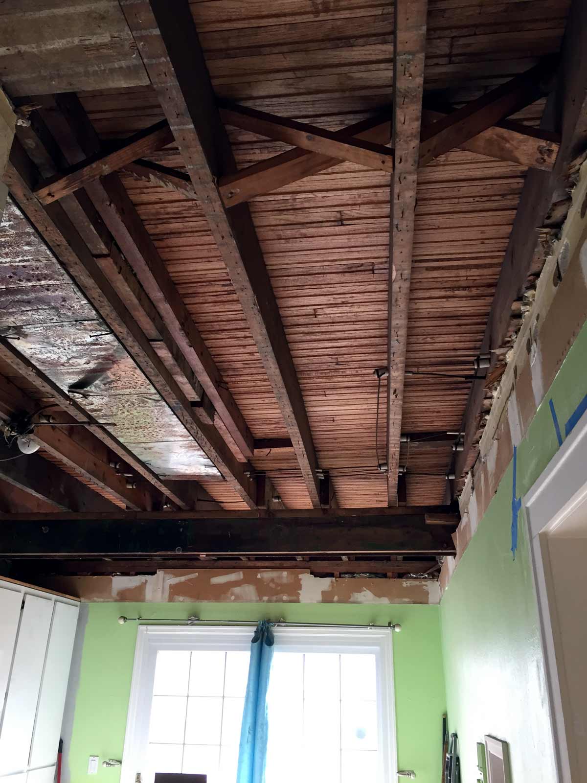Exposed beams under drop ceiling